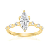 14K YELLOW GOLD 1 1/4CT ROUND/MARQUISE DIAMOND LADIES RING (CENTER STONE MARQUISE DIAMOND 1CT)