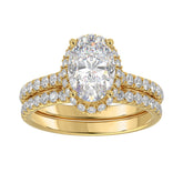 14K YELLOW GOLD 2 3/4CT ROUND/OVAL DIAMOND LADIES BRIDAL RING (CENTER STONE OVAL DIAMOND 2CT)