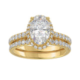 14K YELLOW GOLD 2 3/4CT ROUND/OVAL DIAMOND LADIES BRIDAL RING (CENTER STONE OVAL DIAMOND 2CT)