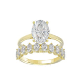LADIES BRIDAL SET 4 1/2CT ROUND/OVAL DIAMOND 14K YELLOW GOLD (CENTER STONE OVAL DIAMOND 3.00CT)