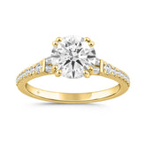 14K YELLOW GOLD 2 1/4CT ROUND/BAGUETTE DIAMOND LADIES RING (CENTER STONE ROUND DIAMOND 2CT)