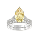 14K WHITE GOLD 3 3/4CT ROUND/PEAR DIAMOND LADIES BRIDAL SET (CENTER STONE PEAR YELLOW DIAMOND 3.00CT)