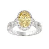 14K WHITE GOLD 4 1/2CT ROUND/YELLOW OVAL DIAMONDLADIES RING (CENTER STONE YELLOW OVAL DIAMOND 2.00CT)