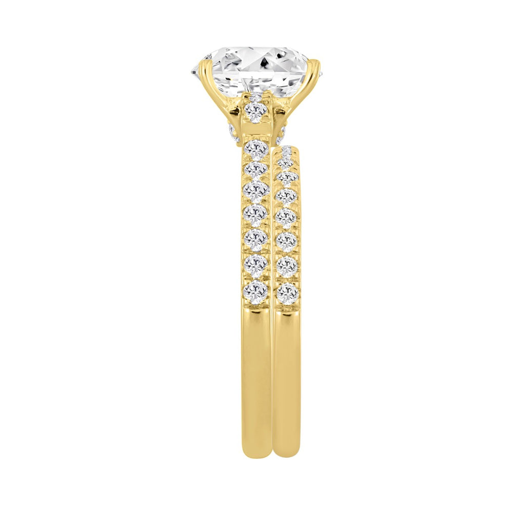 14K YELLOW GOLD 1 1/2CT ROUND/OVAL DIAMOND LADIES BRIDAL SET (CENTER STONE OVAL DIAMOND 1.00CT)
