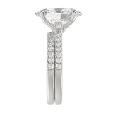14K WHITE GOLD 4 1/2CT ROUND/OVAL DIAMOND LADIES BRIDAL SET (CENTER STONE OVAL DIAMOND 4.00CT)