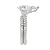 LADIES BRIDAL SET 4 1/2CT ROUND/PEAR DIAMOND 14K WHITE GOLD (CENTER STONE PEAR DIAMOND 4CT )