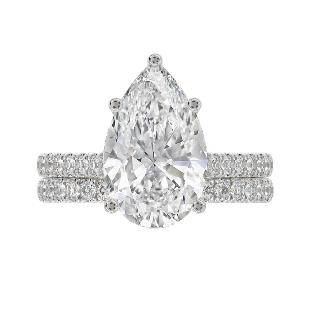 LADIES BRIDAL SET 4 1/2CT ROUND/PEAR DIAMOND 14K WHITE GOLD (CENTER STONE PEAR DIAMOND 4CT )