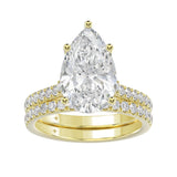 14K YELLOW GOLD 4 1/2CT ROUND/PEAR DIAMOND LADIES BRIDAL SET (CENTER STONE PEAR DIAMOND 4CT)