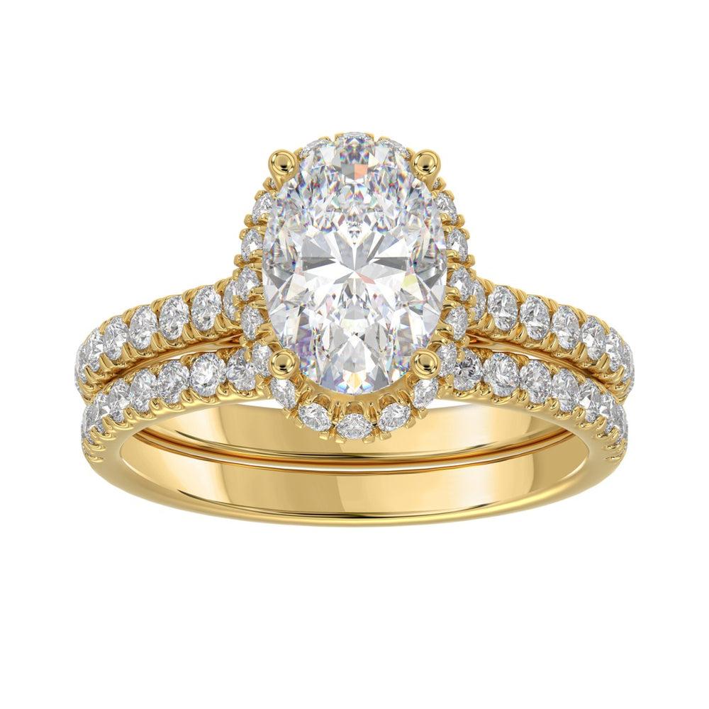14K YELLOW GOLD 2 3/4CT ROUND/OVAL DIAMOND LADIES BRIDAL RING (CENTER STONE OVAL DIAMOND 2CT)