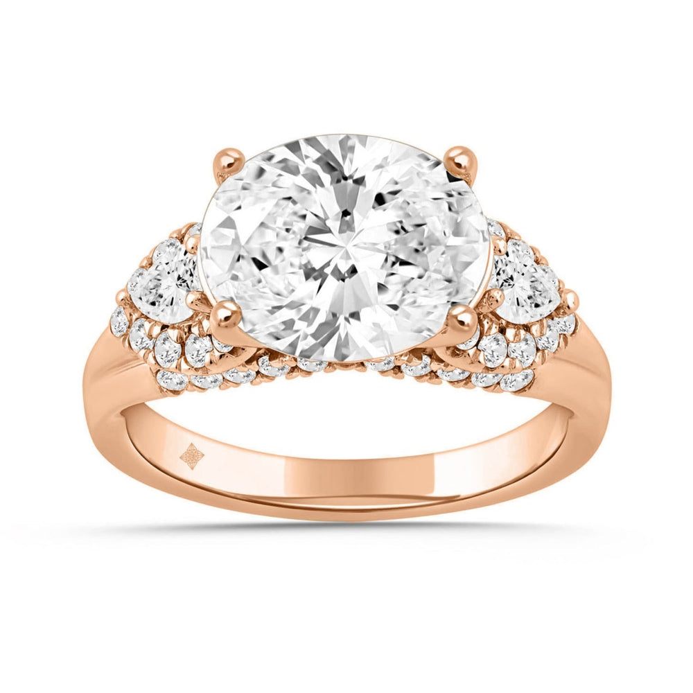14K ROSE GOLD 3 3/4CT ROUND/PEAR/OVAL DIAMOND LADIES RING (CENTER STONE OVAL DIAMOND 3CT)