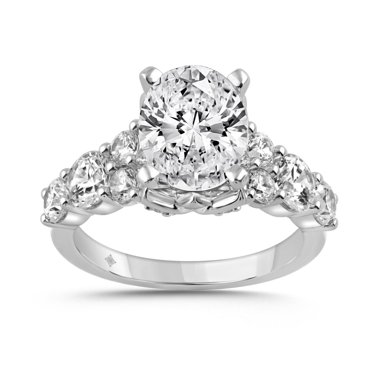 14K WHITE GOLD 4 1/2CT ROUND/OVAL DIAMOND LADIES RING (CENTER STONE OVAL DIAMOND 3CT)