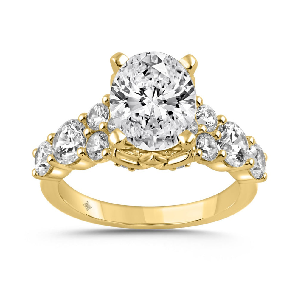 14K YELLOW GOLD 4 1/2CT ROUND/OVAL DIAMOND LADIES RING (CENTER STONE OVAL DIAMOND 3CT)