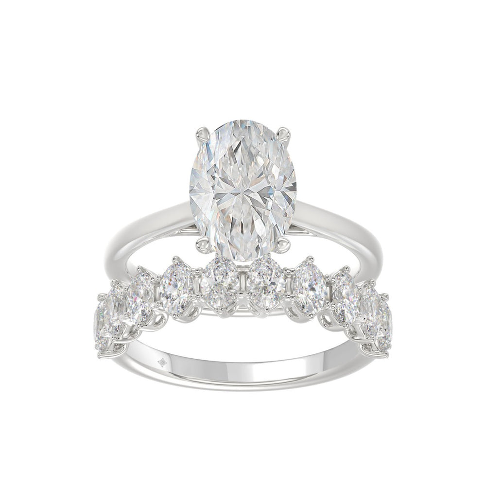 14K WHITE GOLD 4 1/2CT ROUND/OVAL DIAMOND LADIES BRIDAL SET (CENTER STONE OVAL DIAMOND 3.00CT)