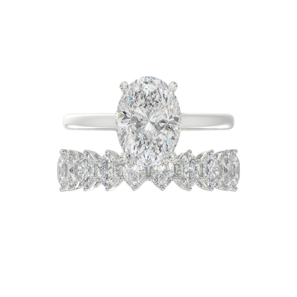 14K WHITE GOLD 4 1/2CT ROUND/OVAL DIAMOND LADIES BRIDAL SET (CENTER STONE OVAL DIAMOND 3.00CT)