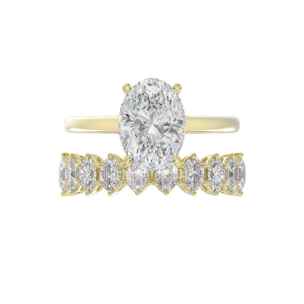 14K YELLOW GOLD 4 1/2CT ROUND/OVAL DIAMOND LADIES BRIDAL SET (CENTER STONE OVAL DIAMOND 3.00CT)
