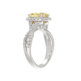 14K WHITE GOLD 4 1/2CT ROUND/YELLOW OVAL DIAMONDLADIES RING (CENTER STONE YELLOW OVAL DIAMOND 2.00CT)