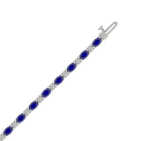 14K WHITE GOLD 6 7/8CT ROUND/OVAL DIAMOND LADIES BRACELET (BLUE SAPPHIRE OVAL 6 1/6CT)