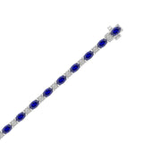 14K WHITE GOLD 6 7/8CT ROUND/OVAL DIAMOND LADIES BRACELET (BLUE SAPPHIRE OVAL 6 1/6CT)