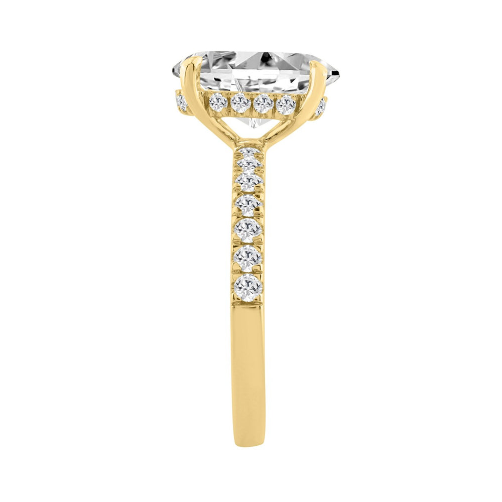 14K YELLOW GOLD 3 1/2CT ROUND/OVAL DIAMOND LADIES RING (CENTER STONE OVAL DIAMOND 3CT)