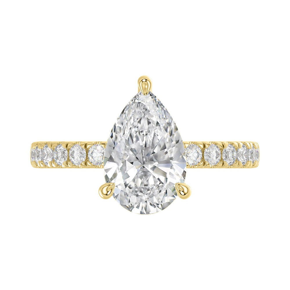 14K YELLOW GOLD 3 1/2CT ROUND/PEAR DIAMOND LADIES RING (CENTER STONE PEAR DIAMOND 3CT)